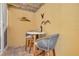 Relaxing patio space with outdoor seating and decorative wall art at 315 Ridge Rd, Palm Harbor, FL 34683