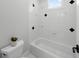 Clean white bathroom with decorative tile accents at 3212 W Fountain Blvd, Tampa, FL 33609