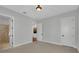 Neutral bedroom with bright connecting ensuite bathroom and carpeted floors at 3212 W Fountain Blvd, Tampa, FL 33609