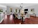 Bright living room with fireplace, access to pool and patio area, and neutral decor at 3212 W Fountain Blvd, Tampa, FL 33609