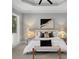 Beautiful main bedroom with tray ceiling, neutral colors and a large window at 3212 W Fountain Blvd, Tampa, FL 33609