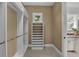 Organized walk-in closet with custom shelving and natural light from window at 3212 W Fountain Blvd, Tampa, FL 33609