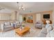 Inviting living room with neutral paint, tile floor, and large windows for natural light at 3569 Oak Lake Dr, Palm Harbor, FL 34684