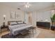 Stylish main bedroom featuring modern decor, neutral tones, and ample natural light at 3569 Oak Lake Dr, Palm Harbor, FL 34684