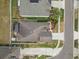 Aerial view of home showcasing backyard, patio, landscaping, and neighborhood at 35819 Diamond Head Ct, Zephyrhills, FL 33541