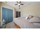 Bedroom features a window and full closet perfect for storage and comfortable decor at 35819 Diamond Head Ct, Zephyrhills, FL 33541
