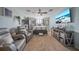 Bedroom features plush seating, media center, and lots of space for relaxing or entertaining at 35819 Diamond Head Ct, Zephyrhills, FL 33541