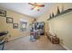 Cozy bedroom featuring neutral walls, and a built-in desk, perfect for work and rest at 35819 Diamond Head Ct, Zephyrhills, FL 33541