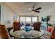Open dining area with table, comfortable seating, ocean views, and access to the living area at 400 Island Way # 1709, Clearwater Beach, FL 33767
