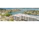 Modern condo building with balconies offers picturesque views of waterfront property and canals at 400 Island Way # 1709, Clearwater Beach, FL 33767