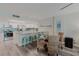 Open concept dining area with stylish decor flowing into the modern kitchen at 400 Island Way # 1709, Clearwater Beach, FL 33767