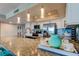 Kitchen with stainless steel appliances, granite countertops, light cabinetry, breakfast bar and wood flooring at 400 Island Way # 1709, Clearwater Beach, FL 33767