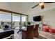 Inviting living area with a TV, waterfront views, and comfortable seating, perfect for relaxation at 400 Island Way # 1709, Clearwater Beach, FL 33767