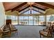 Meeting room boasts vaulted ceilings and floor to ceiling windows with water views at 400 Island Way # 1709, Clearwater Beach, FL 33767