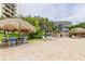 Outdoor pool area features ample seating and lounging options at 400 Island Way # 1709, Clearwater Beach, FL 33767