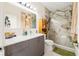 Modern bathroom with white quartz countertops, chrome fixtures, and marble shower at 4108 N Thatcher, Tampa, FL 33614