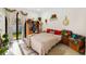 Charming bedroom with a sliding glass door, decorative plants, and light at 4108 N Thatcher, Tampa, FL 33614