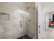 New shower with tile surround, rainfall shower head, and glass door at 4108 N Thatcher, Tampa, FL 33614