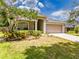 Attractive house with a tidy lawn and an attached two-car garage at 412 Henderson Ave, Seffner, FL 33584