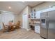 Bright kitchen includes stainless appliances, lots of storage, and a breakfast nook at 412 Henderson Ave, Seffner, FL 33584