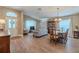 Open floorplan living room showcases an open floorplan, neutral paint, and lots of seating at 412 Henderson Ave, Seffner, FL 33584