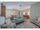 Inviting living room with a dining area, neutral paint, and cozy furniture at 412 Henderson Ave, Seffner, FL 33584