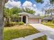 Inviting front porch with rocking chairs, offering a relaxing outdoor space at 412 Henderson Ave, Seffner, FL 33584