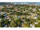 Birds-eye view of property showing neighborhood, proximity to amenities, and mature landscaping at 4513 S Hesperides St, Tampa, FL 33611