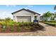 Charming single-story home with manicured landscaping and neutral color palette at 4527 Gardner St, Bradenton, FL 34210
