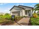 Charming single-story home with manicured landscaping and neutral color palette at 4527 Gardner St, Bradenton, FL 34210