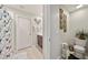 Bright bathroom showcasing the vanity, toilet, decor, and shower with patterned curtain at 4533 Eternal Prince Dr, Sun City Center, FL 33573
