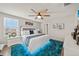 Chic bedroom featuring modern lighting, a stylish area rug, and comfortable bedding at 4533 Eternal Prince Dr, Sun City Center, FL 33573