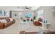 Cozy living room with tile floors, comfortable seating, and lots of natural light at 4533 Eternal Prince Dr, Sun City Center, FL 33573