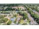 Neighborhood aerial view featuring mature trees, well-maintained homes, and green spaces at 4708 Ranch Grove Ct, Valrico, FL 33596