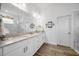 Bathroom with double vanity, tile floors and walk-in shower at 4831 Rosatti Rd, Wesley Chapel, FL 33543