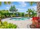 A community spa surrounded by lush landscaping, providing a serene and relaxing atmosphere at 4831 Rosatti Rd, Wesley Chapel, FL 33543