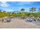 Outdoor fire pit area with comfortable seating, creating a cozy and inviting space for socializing and relaxation at 4831 Rosatti Rd, Wesley Chapel, FL 33543