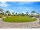 Expansive manicured lawn surrounded by lush landscaping and walking path at 4831 Rosatti Rd, Wesley Chapel, FL 33543