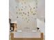 A modern lobby features a stunning chandelier and a stylish reception desk with the community's logo displayed on the wall at 4831 Rosatti Rd, Wesley Chapel, FL 33543