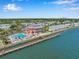 Community aerial view showcasing the pool, clubhouse, and waterfront access at 4872 Beach Se Dr # D, St Petersburg, FL 33705
