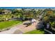 Aerial view of the gated community entrance, showcasing manicured landscaping and coastal architecture at 4872 Beach Se Dr # D, St Petersburg, FL 33705