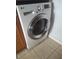 Modern LG washing machine in the laundry room, featuring an efficient design and digital controls at 4872 Beach Se Dr # D, St Petersburg, FL 33705