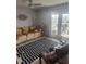 Bright living room with balcony access provides indoor/outdoor living at 4872 Beach Se Dr # D, St Petersburg, FL 33705
