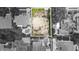 An aerial photo zooms into vacant land with address 5029 W Dickens Ave, Tampa, FL 33629 in a residential neighborhood at 5029 W Dickens Ave, Tampa, FL 33629