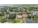 Aerial view of a vacant lot outlined in red with luxury homes and landscaping in an upscale residential neighborhood at 5029 W Dickens Ave, Tampa, FL 33629