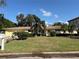 Charming single-story home with a well-maintained lawn and lush landscaping, offering great curb appeal and a welcoming atmosphere at 5029 W Dickens Ave, Tampa, FL 33629