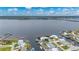 Stunning aerial view of a waterfront property and neighborhood on a sunny day at 5193 Boyle Ter, Port Charlotte, FL 33981