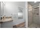 Bathroom featuring updated shower and modern fixtures at 5193 Boyle Ter, Port Charlotte, FL 33981