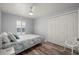 Comfortable bedroom with a window, closet, and light colored walls at 5193 Boyle Ter, Port Charlotte, FL 33981