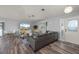 Inviting living room with stylish furniture, modern decor, and wood-look floors at 5193 Boyle Ter, Port Charlotte, FL 33981